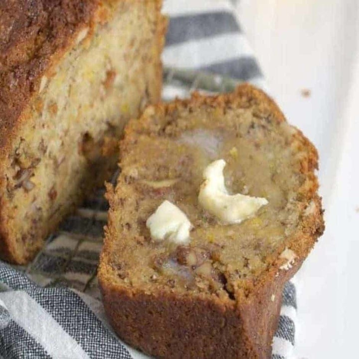 Banana bread with butter on top.